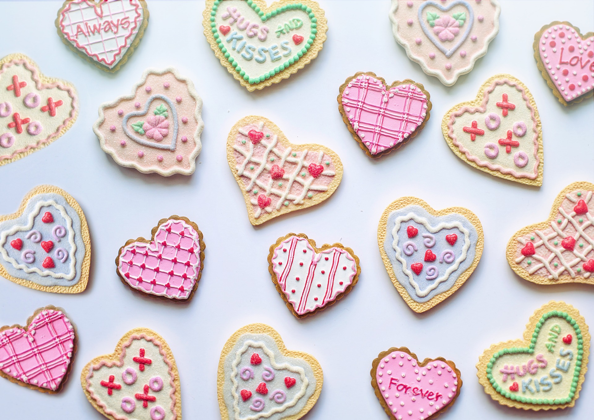 A collection of beautifully decorated heart-shaped cookies, perfect for Valentine's Day